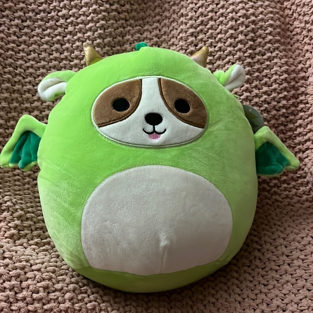 Dog in a dragon costume Squishmallow.